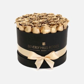 Order Golden Flowers Dubai Online - Gold Roses Round Box