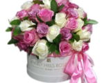 White, Pink & Purple roses in 'Sweet Mix' in hat box