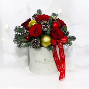 Red roses in christmas gift box