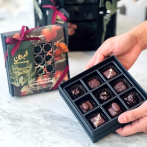 Mirzam Bustan Selection Truffles 9 pcs box in hand